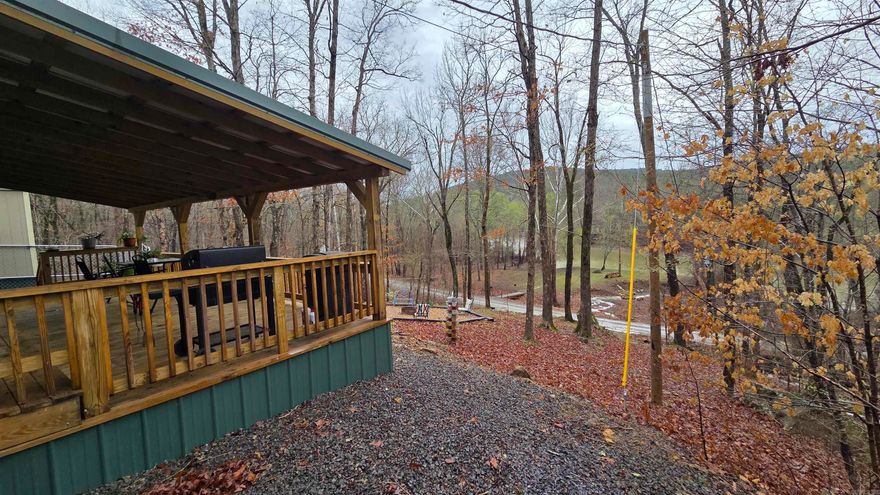 Your dream lakefront retreat on stunning Greers Ferry Lake is here! This newly remodeled & constructed 2-bedroom home is move-in ready and offers the ultimate private getaway. Relax on the expansive deck with porch swing, enjoying panoramic views over the clear, renowned waters of Greers Ferry Lake—perfect for world-class fishing and boating. Direct shoreline access lets you pull right up to unload your day's catfish catch or refill the cooler—effortless lake living at its best. New metal roof, siding, windows, doors, flooring, appliances, & more plus all-new HVAC systems. Cozy modern interior with office space just at the top of the stairs. On approx. 2.40 acres of unrestricted, private land, ideal for hunting (deer & fish in the pics harvested right here from the property & lake! Ample storage: 2-car carport + 3 large outbuildings (one fully heated/cooled, others insulated with power) to keep boats, ATVs, and lake toys dry and secure. Property is gated too!  Turn-key perfection blending modern upgrades, prime lake location, and endless outdoor adventures all steps away. White line is at the waters edge! Call today for your tour!