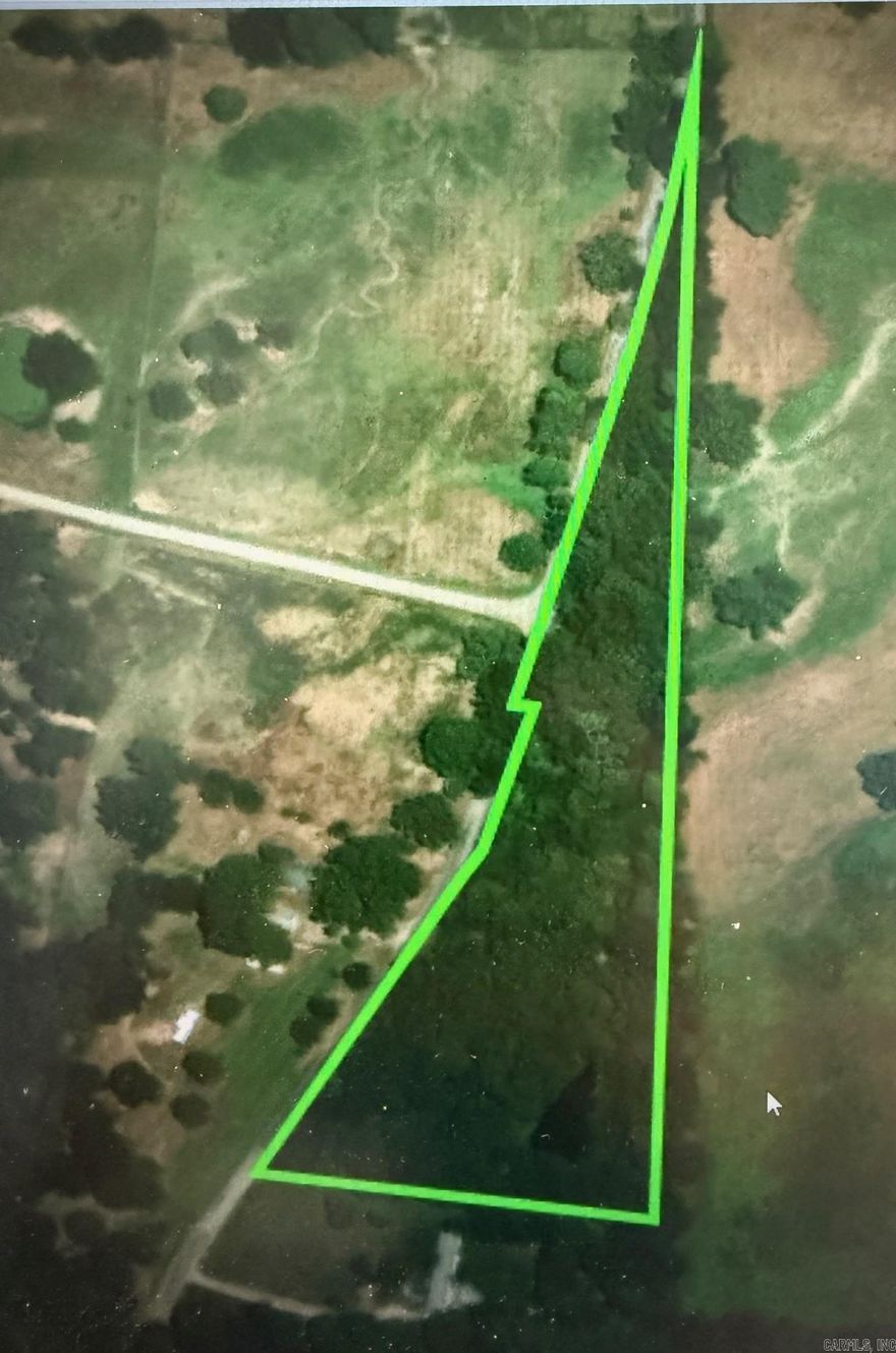 This is a small wooded 3.1 acres with a pond and small timber. Utilities are located at the road.  Good acreage for a building spot and/or place for animals and is partially fenced.  It has road frontage on Barranger Road and is conveniently located to main thoroughfare for surrounding towns. Call or text agent today!