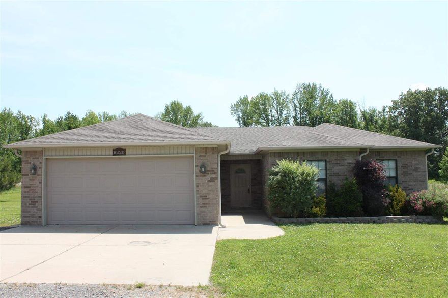 Just like new! Country living on 1 acre, 3 bedrooms, 2 baths. Laminate flooring in kitchen, dining and living areas.  25 x 25 work shop with heat & air. Cross fenced to keep the little ones close, but with lots more room for play. This all brick home has a great floor plan. Sit on the back covered patio and enjoy nature.