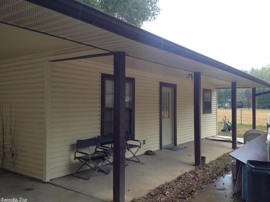 Cute 1 bd, 1 ba home with carport across the street from the river.