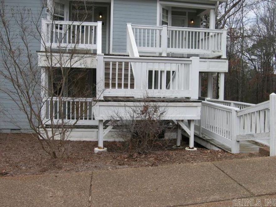 EFFICIENCY STUDIO with quick occupancy. Full bath.  Kitchen has refrigerator  & stove.  Some furniture is included.  Laundry closet added on rear deck, and a dryer only included!  Brand new Mitsubishi minisplit with remote.  Flooring is ceramic tile, laminate, & carpet.  Also included is a large dresser, 2 room screen dividers, "pantry" cabinet, daybed (NO mattress) , small table with 2 chairs, and electric heater.  Rear deck overlooks wooded area.  Easy, quick possession.  Selling it As Is,  Enjoy membership to all Fairfield Bay Resort amenities!  Marina, golf, tennis, pools & parks, bowling alley, restaurants.  Over 90 miles of ATV/UTV trails, hiking trails, & more!!! Call for Resort Dues & condo fees.