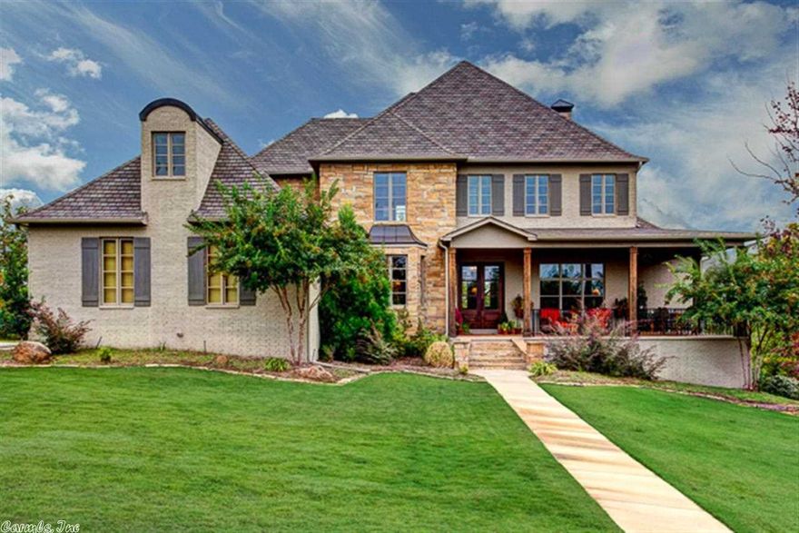 Elegant country estate near the top of the hill includes 1.04 acres!!  Corner Lot in Waterview!!  Beautiful dark stained oak floors!! Library with the most beautiful windows and commanding views!!  Covered Porches front and back!!  Den with stone fireplace!! Huge MBR Retreat with fireplace and rain shower bath!!  Wonderful closets!! Chefs kitchen with 2 refrigerators, ice maker and lots more!!  Large Formal Dining!!  Guest bedroom on the main level!!  Game Room!!  Home Theatre!! This home is amazing!!