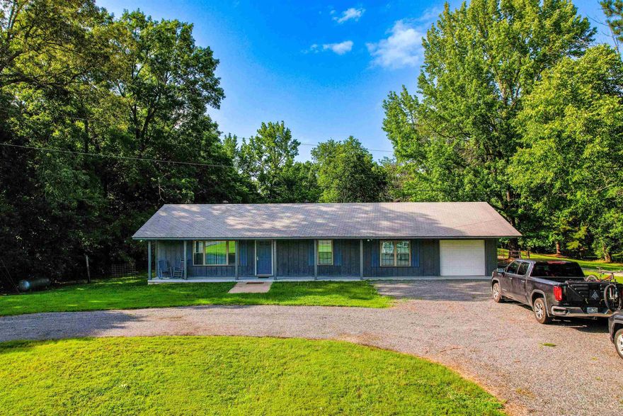 Located just outside Mount Ida off Hwy 270, this well-maintained 3-bedroom, 2-bath home offers 1,531 square feet of comfortable living space. Currently used as a successful short-term rental, the property is fully set up for everyday living or investment use. The open layout features a spacious living area, dining space, and a functional kitchen with modern appliances. All three bedrooms include queen beds, and there’s a sleeper sofa in the living room for added flexibility. Outside, guests can enjoy a private backyard with a fire pit and grill area. The property sits on a level lot with easy access and ample parking—ideal for boats, UTVs, or trailers. Just minutes from Lake Ouachita, Ouachita National Forest, and nearby crystal mines, and less than an hour from Hot Springs, this location is perfect for outdoor enthusiasts or those looking for a quiet retreat with convenience to it all.