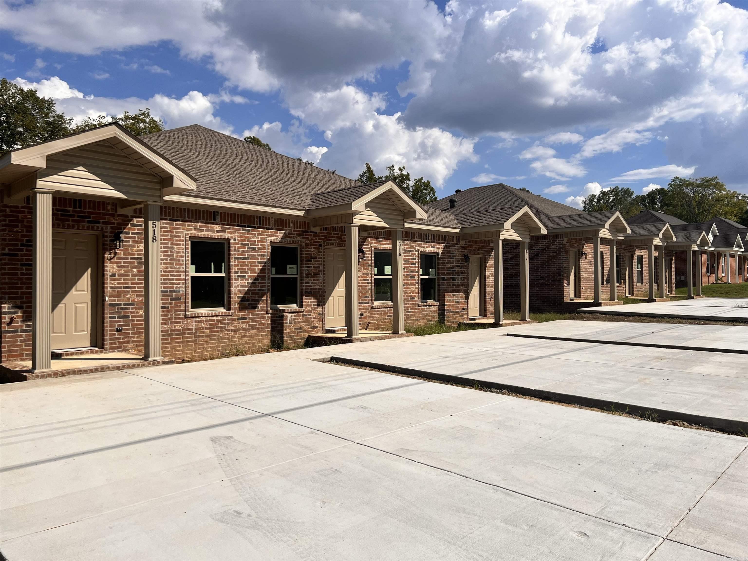 NEW CONSTRUCTION! TWO TRIPLEXES consisting each of two 2BR/1BA and one 1BR/1BA units. Each triplex unit approx. 843 SF. ONE DUPLEX containing two 2BR/1BA units. Each duplex unit approx. 852 SF. All units include 9ft ceilings, granite countertops and laminate flooring. Property ideally located to schools and many city conveniences. Property is cornered by Academy and Oak St.