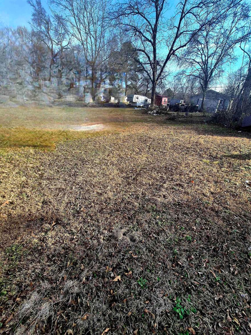 Residential lot .... THERE IS A TRAILER HOME LOCATED ON THE LOT (zero value)  THAT SELLER WILL REMOVE OR CAN CONVEY AT NO VALUE.  BRING YOUR OFFER AND GET IT DUN!