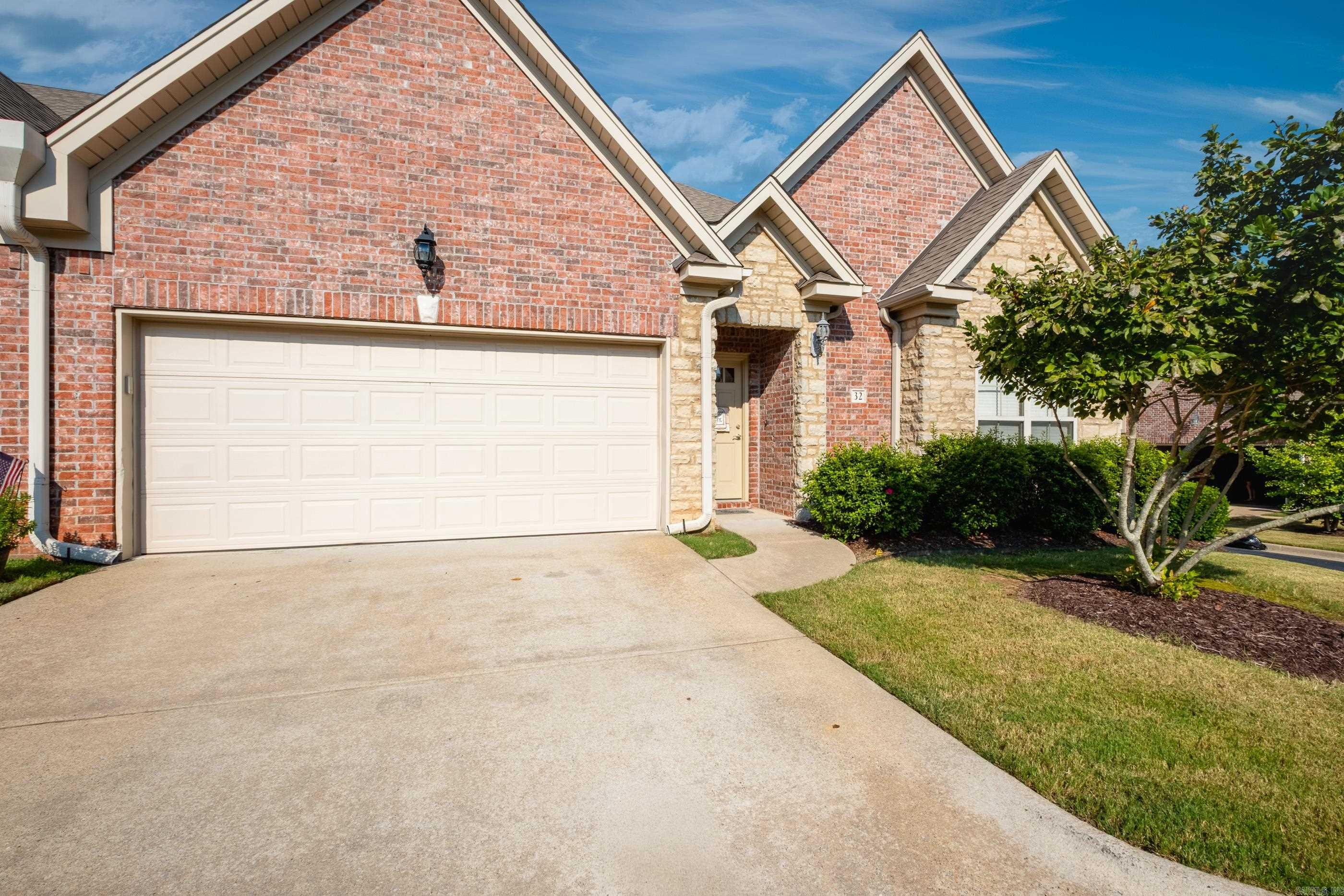 Beautiful and wonderfully maintained patio home in a coveted gated WLR neighborhood. One of the only lots in the neighborhood that backs up to green space. Gorgeous site-laid hardwoods welcome you into the living area and kitchen. A gas log fireplace and built in shelving lead to the kitchen with a breakfast bar and tons of storage. The spacious primary suite has a large bathroom with a walk-in shower and walk-in closet. Enjoy the privacy from the newly updated deck Two-car garage. The POA covers the sprinklers, lawn care, common space landscaping and entry/exit gate maintenance.