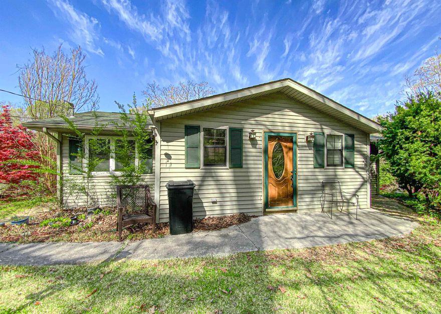 Located just across from Yellville-Summit School in one of the area's most desirable subdivisions, this 3-bedroom, 2-bathroom home is the perfect blend of comfort, space, and convenience. Inside, you’ll find hardwood floors throughout the main level, along with a spacious living area, a dedicated office, and a bonus den in the full basement—perfect for a game room, media space, or guest retreat. The basement also features a workshop and a roll-up garage door, ideal for storing ATVs, lawn equipment, or all your favorite toys. Step out back and enjoy the peaceful sounds of Town Branch Creek running through your yard, with deer and other wildlife often visiting—serene country vibes right in town! Don't miss this rare opportunity. Whether you're looking for a family home or a quiet retreat close to everything, this one checks all the boxes.