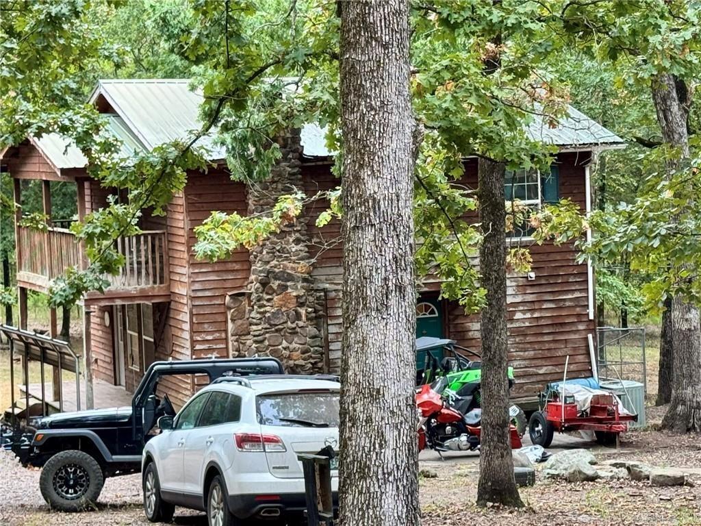 Own a slice of the Ozarks! Set on 5 peaceful acres bordering the National Forest, this charming 3-bedroom, 2-bath home offers the perfect blend of privacy, comfort, and country living. With over 800 feet of forest frontage and the entire right side of the access road included, youāll enjoy unmatched space to explore and relax. The home features a cozy woodstove, eat-in kitchen, and plenty of natural light, creating a warm and welcoming atmosphere. Outside, youāll find a detached workshop, chicken coop, and garden-ready areasāideal for anyone dreaming of a small homestead or weekend retreat. Stay connected with fiber optic high-speed internet, yet still escape the noise of city life. Just minutes from the scenic Horsehead Lake Recreation Area, this property is perfectly positioned for outdoor adventures, fishing, or peaceful evenings under the stars. Whether youāre looking for a getaway or a full-time home, this property delivers the best of country living at an incredible value. Schedule your showing today and experience it for yourself!