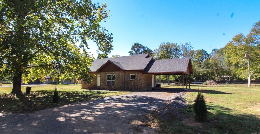 Welcome to this charming 3-bedroom, 2-bathroom home that offers a peaceful country feeling just outside the city limits. The spacious living area provides a comfortable place to relax, and the large windows let in plenty of natural light. With a dedicated laundry room, your household chores become a breeze. This property boasts a range of recent upgrades, including a new roof, new floors, new HVAC, new heater, new carpet, new windows, and much more! This home is a perfect blend of modern convenience and tranquil living. Don't miss the opportunity to make it yours!