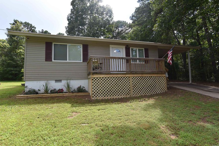 LOCATED NEAR THE ENTRANCE OF THE FAIRFIELD BAY MARINA, welcome to this move in ready, fully furnished LAKE HOME. The seller is MOTIVATED and encourages all reasonable offers.  This is the perfect second home, vacation home, short term rental, or your cozy dream home.  Fully updated with a nicely appointed kitchen, upgraded shower & tub combo, luxury vinyl plank flooring, neutral color palette and much more.  The furnishings are top notch and the appliances, including washer and dryer are too, plus the HVAC is new.  The oversized yard with new deck features a deluxe swing set, firepit and is ready for outdoor relaxing and entertainment.  Located in the picturesque, Ozark town of Fairfield Bay, Arkansas, nestled on the shores of Greers Ferry Lake with amenities such as 3 swimming pools, full-service marina, 2 golf courses, tennis & pickleball courts, ATV trails and more this truly is a turn-key gem.