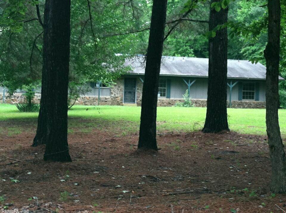 +/- 2 ACRES OF LAND AND MUCH MORE is what this single family home is offering. More features include 3 bedrooms and 2 baths, tile floor in the den with a floor to ceiling fireplace to cozy up next to, spacious eat-in kitchen, separate laundry room REO PROPERTY-BANK OWNED. PROPERTY SOLD AS IS. The Listing Broker & Seller assume no responsibility & make no guarantees, warranties or representations as to accuracy of the property information or photographs. Buyer to turn on Utilities for INSPECTIONS.