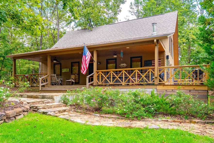 Discover your retreat at 175 Jimmerson Rd in Higden, Ar! Nestled in a serene setting on the water, this property is the perfect blend of relaxation and functionality. Just a short walk through the woods from your backyard brings you straight to the water's edge, making lake days super convenient, and only 2 minutes away from Lacy's marina! Enjoy evenings in the screened-in hot tub pavilion, where you can soak in the peaceful surroundings. The property also boasts a spacious enclosed garage, large enough to accommodate two boats, vehicles, and all your extra toys!  Whether you're seeking a weekend lake house, a full-time residence, or an investment property, this is the one!
