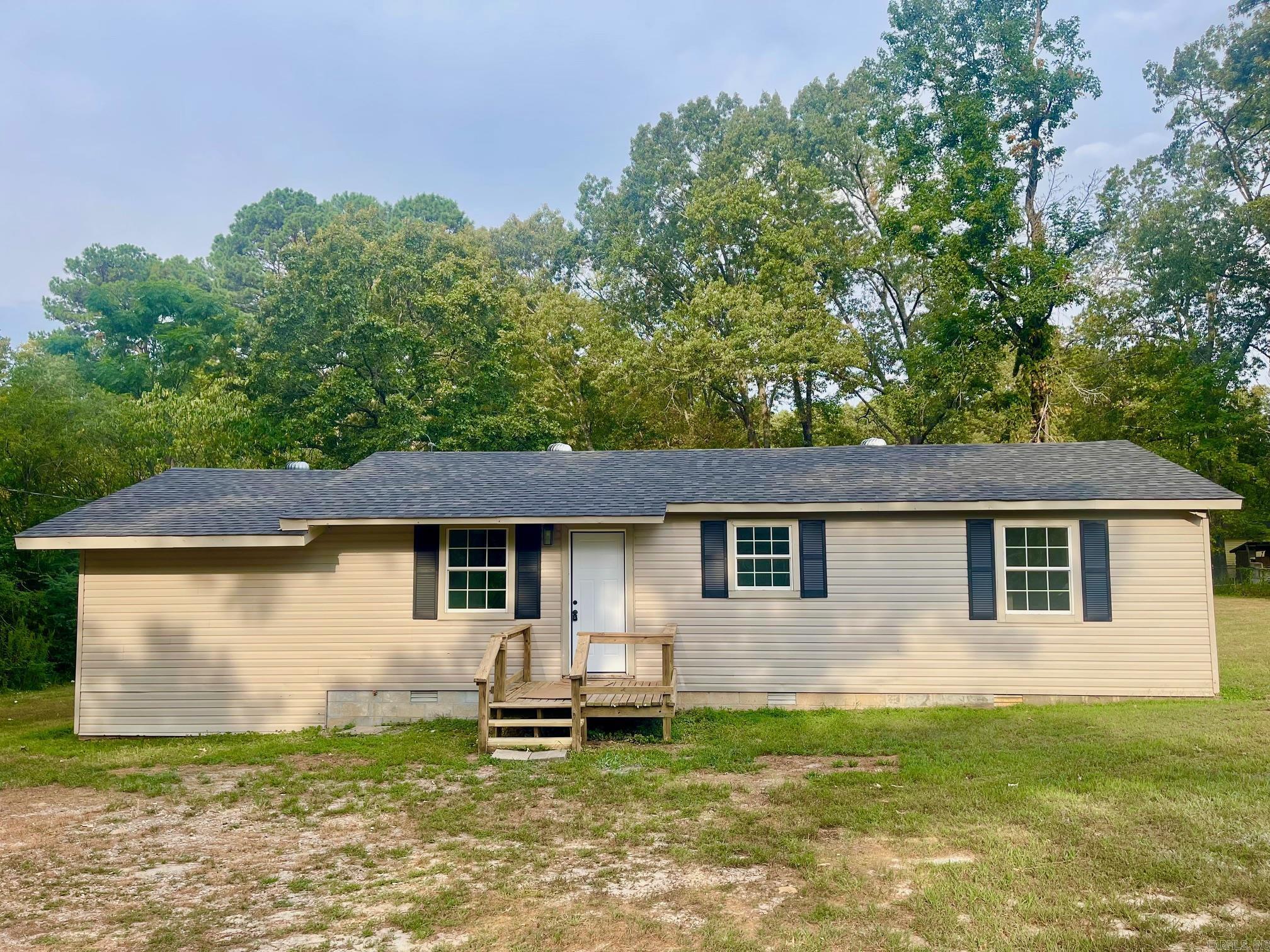 This completely remodeled home is located in the East End Community of Saline County. It features four bedrooms, with two smaller ones perfect for an office or nursery, and one bathroom. There is a den and a living area, either of which could be used as a dining room. The home boasts fresh interior paint and new flooring, along with a fully renovated bathroom that includes a new tub/shower, vanity, and toilet. The kitchen is newly equipped with cabinets, countertops, a stove, dishwasher, and microwave vent-a-hood. Nestled in a private setting on over half an acre, the property offers a mostly fenced yard. Lease terms require a one-year lease, a $1,100 deposit, and $1,100 monthly rent. Applicants must pass a background check, have stable employment, and provide strong rental references