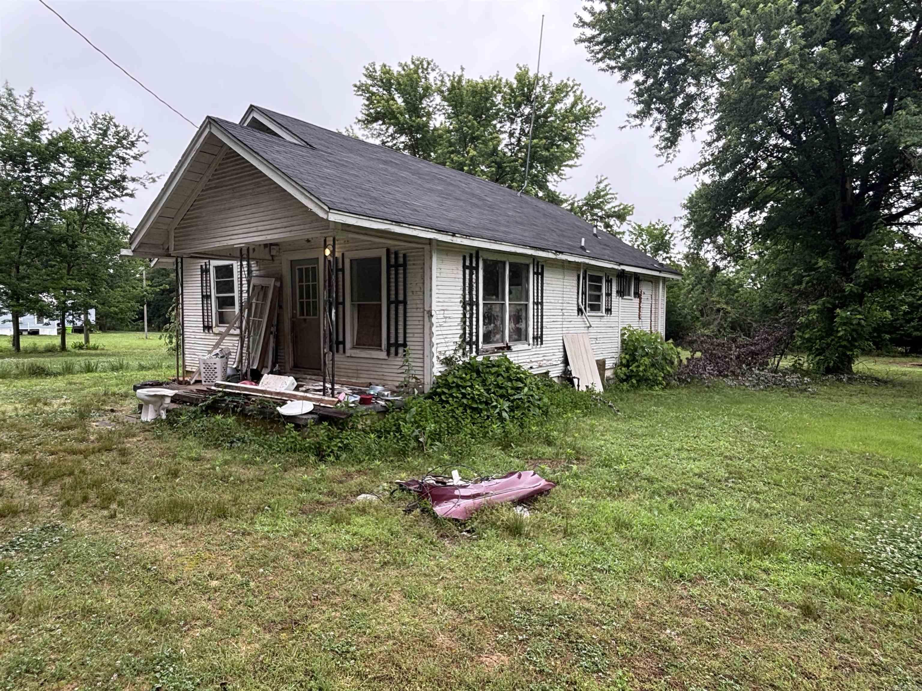 Great Opportunity!! This 2 bedroom, 1 bath home sits on a spacious 1-acre lot and is ready for your personal touch. Whether you're looking to renovate or invest, this property has potential with its peaceful setting and room to grow. Sold as-is ā bring your vision and make it your own! Storm cellar, new water heater and electric panel!