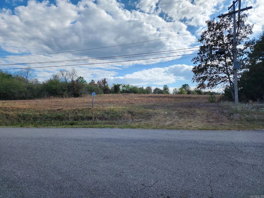 13.5 acres split from a large tract 24 acres +/- of land just across from Bald Knob Country Club. It has frontages off Center St. & the backside may can be reached at the dead end of Linda Ln. May be ideal to build a subdivision with qualifying access roads or just build with privacy in a great area. Water & electric are at the roads. This tract has a gas line easement across it. Seller retains all mineral rights.