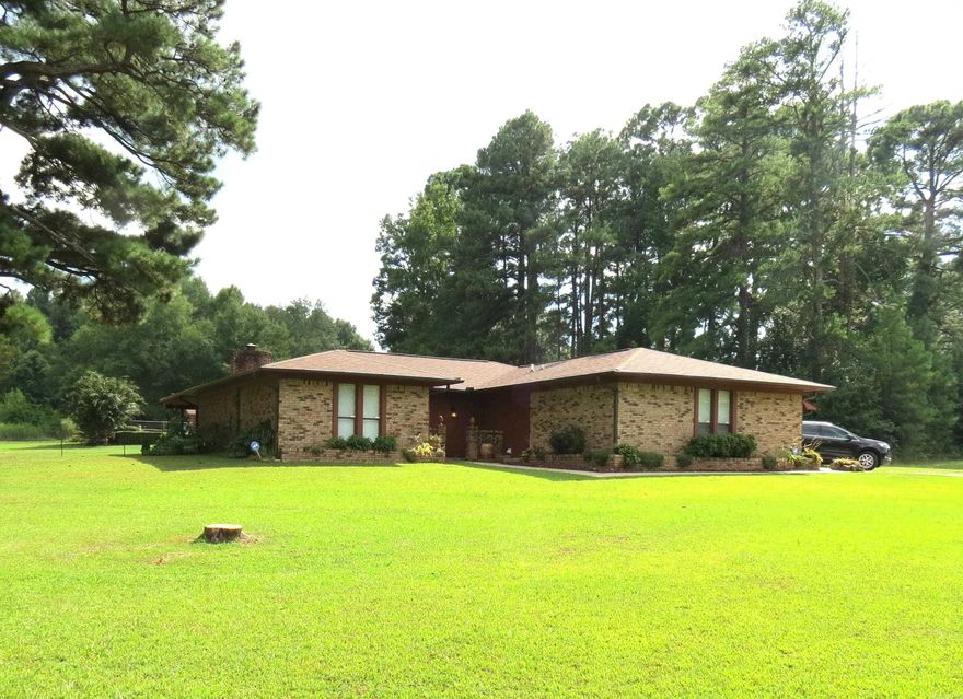 Bring your family to this well-maintained home that sits on 1.25 acres and offers 4 bedrooms, 2 baths, 2 living areas, large pantry/butler pantry. This home has had many updates, all electric and set up for a generator. Roof/gutters 6 years old, New septic tank 2021, hot water heater 2023, flooring 2022. Fireplace. Step into your backyard oasis, featuring a fenced 20x40 inground pool with newer liner. Pool house. Additionally, the home features a versatile shop with electricity. Small storage building. Refrigerator, washer/dryer and window unit in shop all Convey with the property. Pool is ready for your summer fun!!!  Taxes are after HC Credit.  Call today to schedule your personal tour.