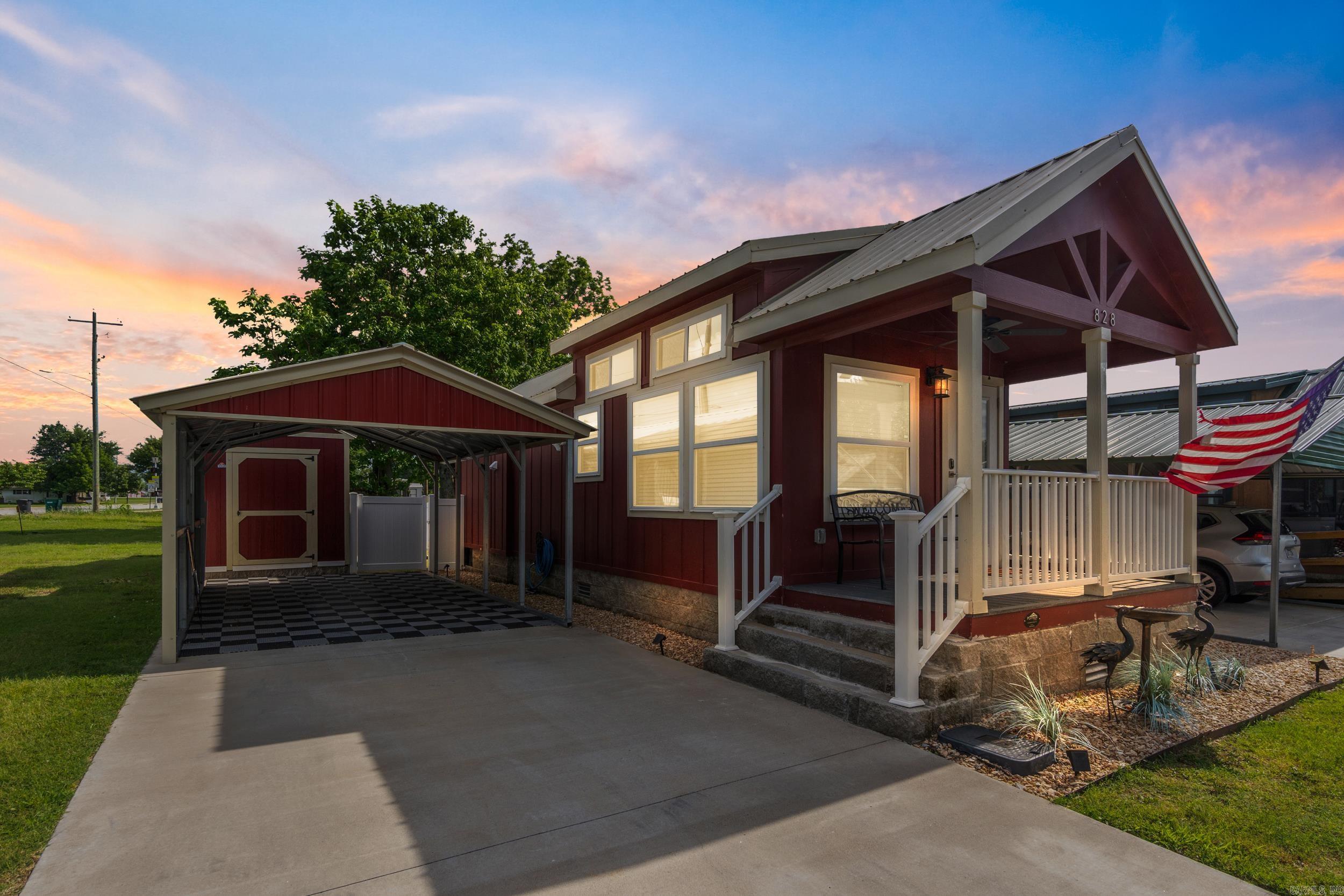 *Seller has been relocated, and price has been drastically reduced for an immediate sale!* Thoughtfully designed by Platinum Cottages, this cozy yet spacious 1-bedroom home blends luxury, comfort, and simplicityāwithout the maintenance. Enjoy a full bath with walk-in shower and premium automated bidet, a dream kitchen with full-size appliances, LG front-load washer and dryer, and smart storage throughout. Built on a permanent concrete block foundation with durable cement board siding, metal roof, and double-pane windows, itās made to last with minimal upkeep. High ceilings, LED lighting, dual split-system HVAC, and abundant natural light create a bright, energy-efficient space year-round. Outside, you'll find a matching 8x12 utility building, garden shed, backyard deck, covered carport, and a fully fenced yard with pet-friendly vinyl fencing. Best of all, lawncare is included (fenced area excluded), so you can truly relax. Whether you're downsizing, simplifying, or just seeking a peaceful, stylish retreat, this home offers it allāpriced to sell fast, donāt miss your chance! All reasonable offers considered!