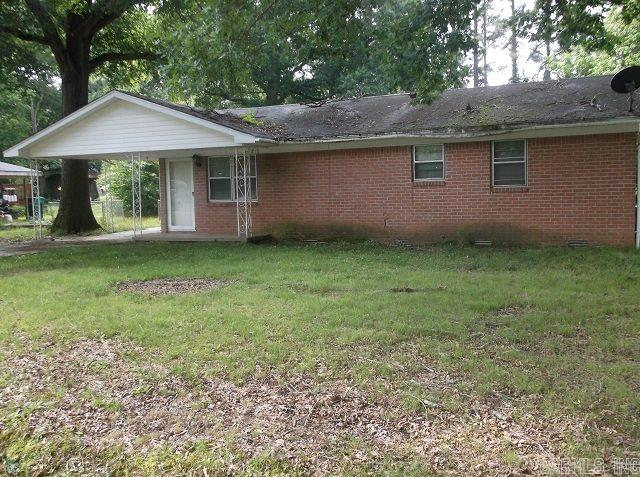 SOLD AS IS this 3 Bed rm, 1.5 Bath, Large Great rm, Den w/ Fireplace, lot's of storage thru out house, Fully fence yard, and 1 Car Carport, this house is not far from Fishing, Freeway