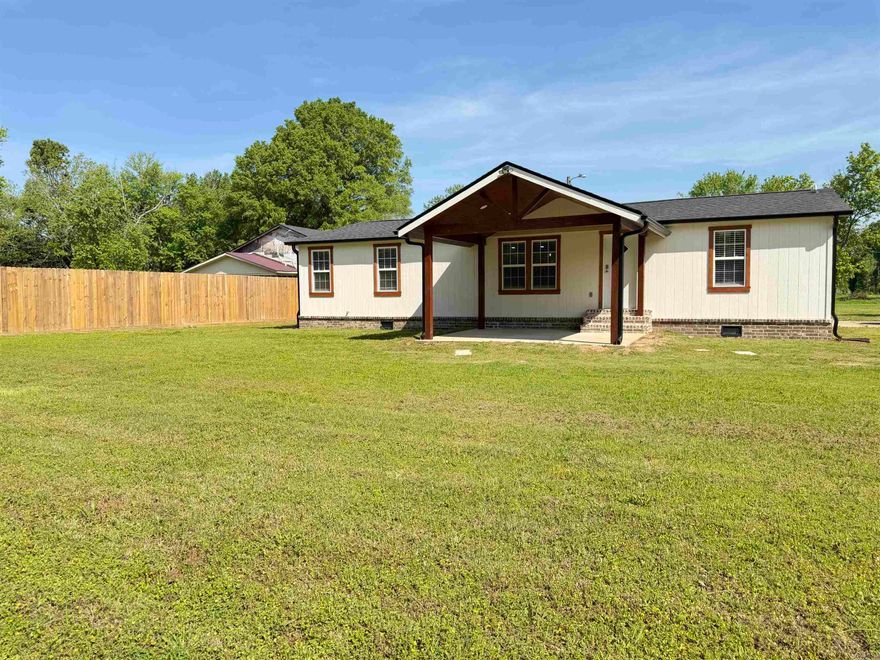 Completely updated, this beautifully renovated home blends modern comfort with farmhouse style. Vaulted ceilings, floating wood shelves & a smart kitchen island lend the open concept kitchen, living, dining rooms to feel spacious & are perfect for entertaining. Take the party outside & enjoy the ample front & back patios, both covered with stunning pine wood ceilings. Major upgrades include EVERYTHING: from the permanent foundation to the roof, this home is completely new, giving you peace of mind for years to come. Bask in country living with an easy commute to LR. Do NOT miss this unicorn of a perfect home on half an acre & schedule your tour today! *sq ft is approx., measuring is encouraged