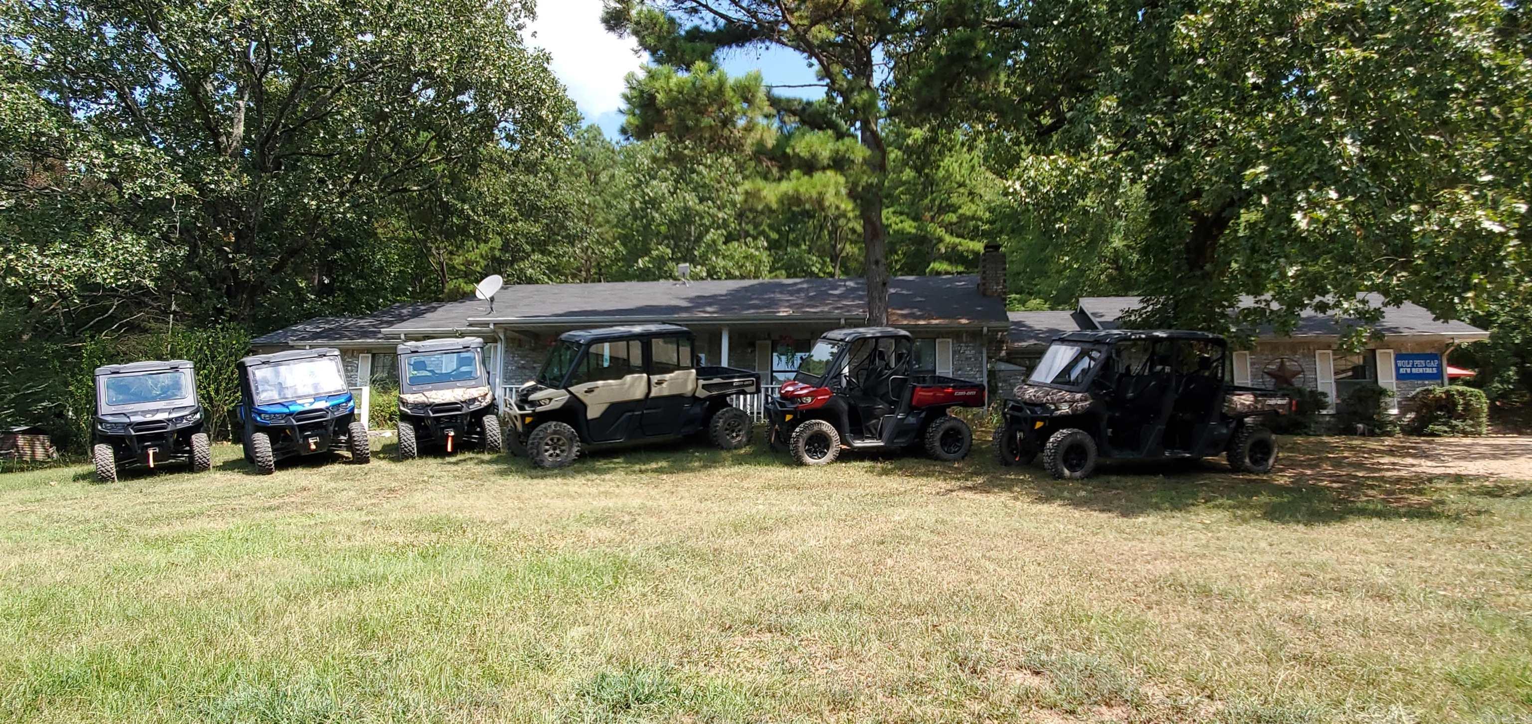 Turn key home, 6.5 acres, thriving ATV business, additional mobile home, carport, garage with office space, all with mountain views and national forest boundary! Main home has a pool, hot tub w/large 2-level deck. 1/2 bath has outside access. Garden spaces, fenced, chicken coop, deer feeders and beautiful views. Hunt right out your back door! Business can also be purchased separately; includes multiple ATVs, equipment, 500 gal gas tank, MH, parts, tools, tire rack w/tires, website, advertisement, supplies and goodwill.