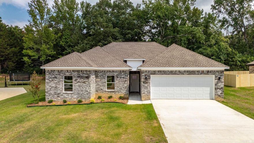 Looking for a 4 bedroom New Construction in Wooster this is it!!! This Split floorplan is designed with family in mind, providing ample space for everyone to enjoy. The large open rooms are perfect for entertaining guests or simply relaxing with loved ones. The astonishing kitchen includes stainless steel appliances, gorgeous granite countertops, pendent lighting and brushed nickel finishes to bring it all together. Dining area The master bathroom includes a custom tiled walk-in shower, jetted tub and a large closet provides plenty of storage space. The spacious rooms throughout the home make it easy to create a cozy and inviting atmosphere that is perfect for family gatherings or quiet evenings at home. Also has a covered back porch, perfect for outdoor activities or just soaking up the sun. Experience love comfort that this home has to offer for you and your family. Call for your private showing today!