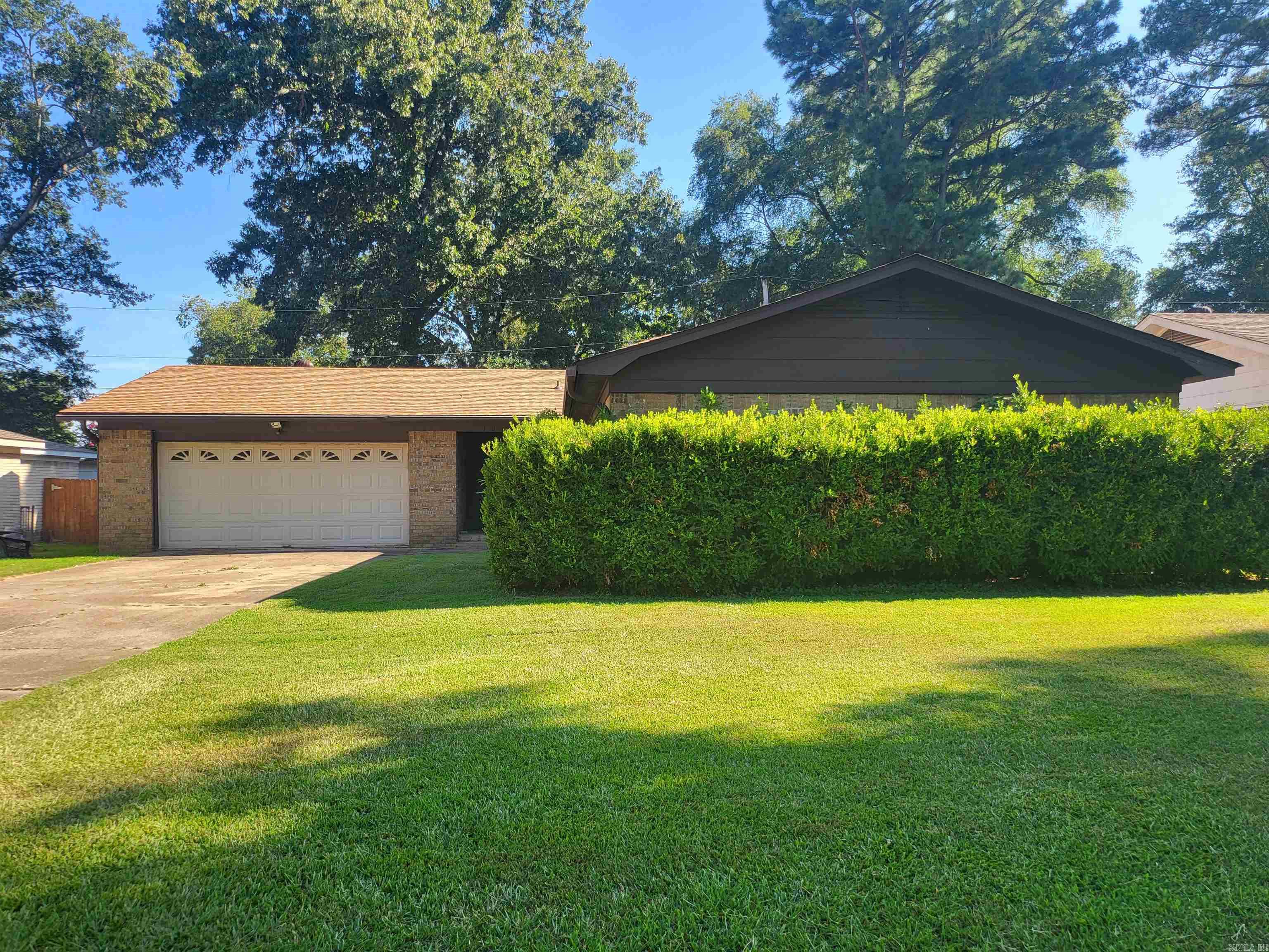 She's a brick HOUUUUUSE! This spacious 3 / 2 conveniently located on a lovely street near the big box stores in Jacksonville might be "the one." "Together time" is the name of the game here! With a massive living area, you and your guests have plenty of space to stretch out and have fun. Wander out to the inviting back patio if you care to take the party there! Spacious two-car garage has a little extra for you -- a storage room that can double as extra pantry space if needed! Long, wide driveway can accommodate many guests or residents with ease. Step out of the heat and into the kickin' a/c in this one. Contact your favorite Realtor for a tour.