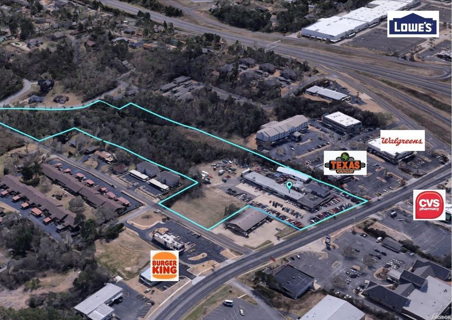 This 11 acre commercial property is one of the last remaining large development tracts on Central Avenue.  With C-4 zoning and visibility from the bypass, this location is as good as it gets in Hot Springs.  The property is situated directly next to Texas Roadhouse, within a mile of both CHI Hospital and Oaklawn Casino. Other nearby establishments include Lowes, Chick-Fil-A, David's Burgers, Walgreens and CVS. 25,000 vehicle avg. daily traffic count. Access to the property is provided along three streets, totaling over 1300' feet of road frontage.  The property includes  27,000+ sq. ft. of retail space; however, the value is primarily in the land.