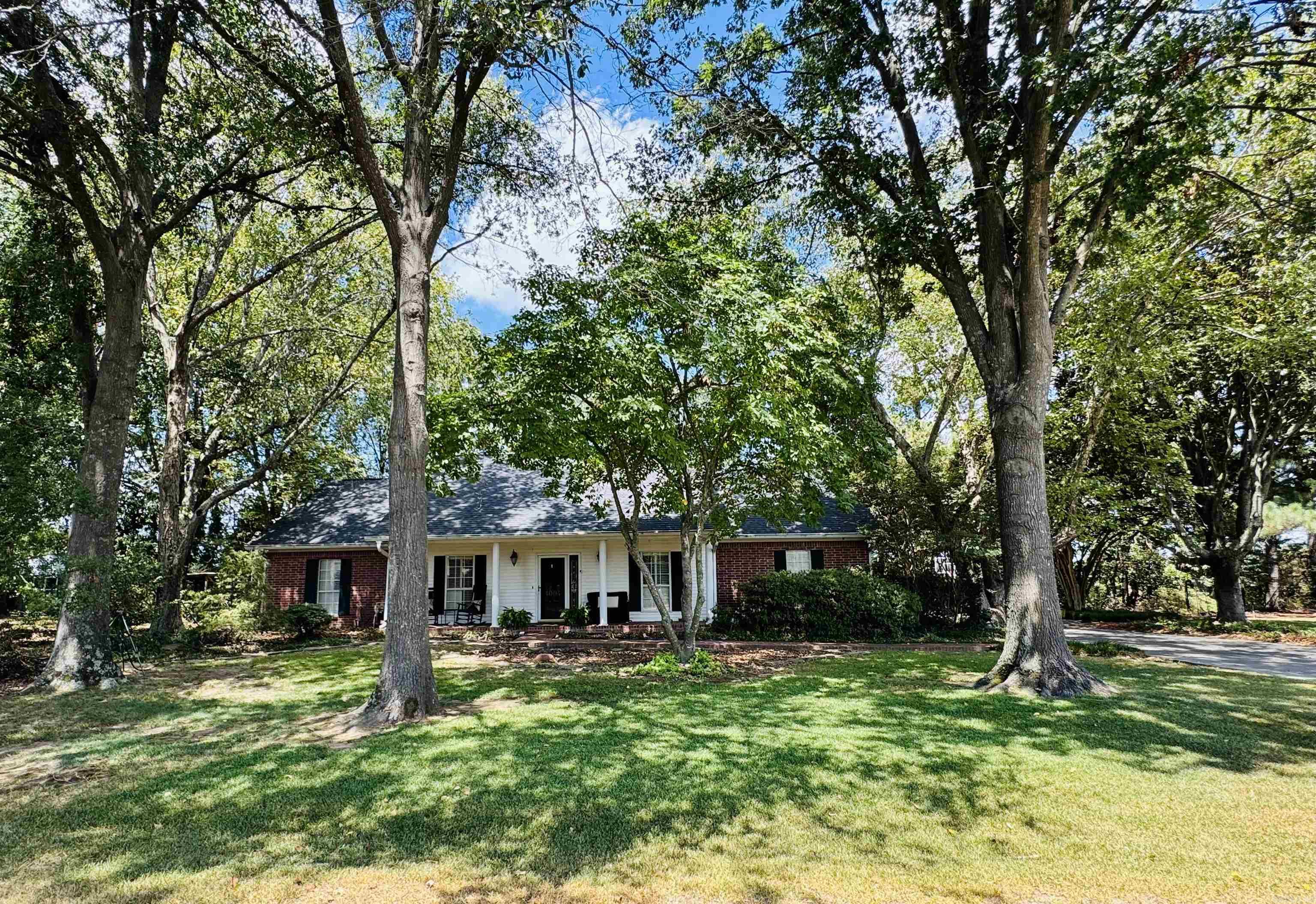 Tucked away on a secluded lane, this charming home feels like a hidden garden retreat while still being conveniently close to town. Surrounded by mature trees and lush landscaping, it offers a peaceful setting with plenty of space to enjoy both indoors and out (1 acre). Inside, youāll find 3 bedrooms and 2 bathrooms, a spacious kitchen, and a welcoming living room complete with fireplace and built-in storage. The wood floors throughout the main living areas add warmth and timeless style. An enclosed patio extends your living space, perfect for relaxing or entertaining year-round. The property also features a 2-car garage, storage shed, and ample parking for visitors. Whether youāre enjoying the private backyard or cozying up by the fire, this home offers comfort and beauty in every season. This is a must-see homeāschedule your showing today! MORE PHOTOS TO COME!