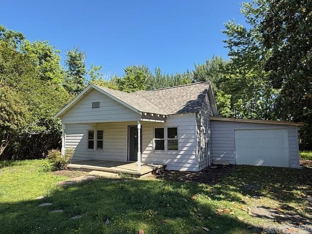 New Roof 2025! Home is located in a fairly secluded spot surrounded by trees. You won't even feel like you are in the center of town. Laminate flooring throughout with a large living room. The kitchen has plenty of cabinetry and a great breakfast bar. The laundry room is spacious. The spare bedrooms are separate from the primary bedroom. Walk in shower in the primary bath with dual vanities. Big secluded yard with shade trees. Home will be sold AS IS Agents see remarks