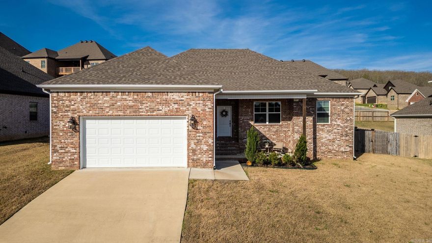 Built in 2022, this well-maintained home offers a modern, open layout with thoughtful finishes and a welcoming feel throughout. Natural light fills the main living areas, where a cozy gas fireplace creates a warm and inviting focal point. The kitchen features ample cabinet and counter space and flows seamlessly into the living area, ideal for everyday living and entertaining. A dedicated in-home office provides a convenient and functional workspace. The primary suite includes a private bath, while additional bedrooms are generously sized and versatile. Enjoy added convenience with a spacious two-car garage offering plenty of room for parking and storage. The fully fenced backyard provides a private outdoor space perfect for relaxing, entertaining, or enjoying time at home. Agents see remarks.