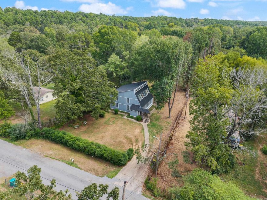 Very motivated sellers!! Welcome to this stunning contemporary farmhouse set on a rare double lot with 1.4 acres in the heart of Little Rock. At only 8 minutes from the Chenal Promenade, this unique property combines modern updates with timeless style, offering plenty of space inside and out.  Step inside to find fresh interior paint, a beautifully renovated primary bath, and a versatile flex space perfect for a home office, playroom, or guest retreat. The home has been thoughtfully updated with a new roof, new exterior paint and siding repairs, and two new HVAC units for comfort and peace of mind.  With its spacious layout, private setting, and stylish design, this property is ideal for those who want both charm and functionality. Whether you’re relaxing on the grounds, entertaining, or enjoying the convenience of its central location, this home truly has it all. Outdoor storage stays, so you'll have room for everything you need.   Don’t miss your chance to own this one-of-a-kind Little Rock gem! Agents, see remarks and docs for any additional info.