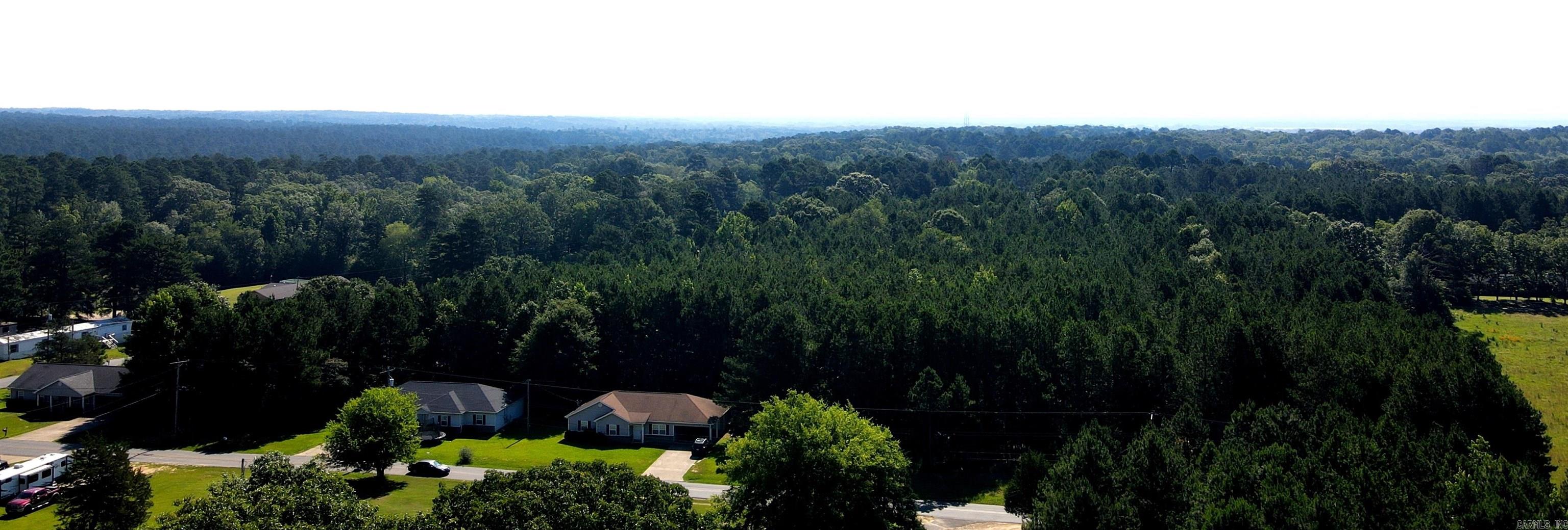 A great location to build your dream home on wooded acreage or developer opportunity. Frontage along Frost Road and W. Dodson Road, only minutes away from Hwy 7 N, Interstate 30, and Lake DeGray.
