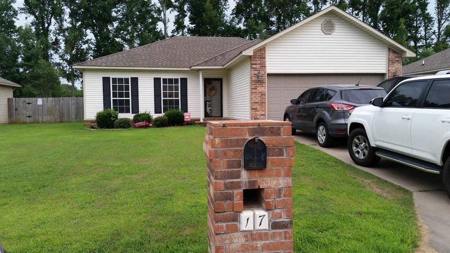 This house is a must see!! It has a HUGE living room and very large Master Bedroom!  Great open floor plan with large bathrooms, big walk in laundry room, and great bedrooms with nice closets.  The kitchen has a bar and stained cabinets.  New wood laminate flooring and new paint also has a new water heater.  Fenced back yard and 2 car garage w/work bench.   Nice quiet neighborhood and easy access to the interstate.  Within the Cabot school district.  Make an appt to see today!  Sq Ft is aprx please measure.