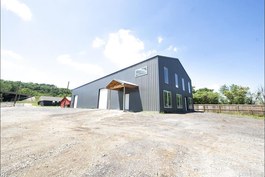 This is an exceptional opportunity for any business seeking a clean, renovated workspace. Ideal for both small and large operations, this property is a must-see! The main shop building spans 4,800 square feet, comprising 3,200 square feet of industrial space and 1,600 square feet of office space, with 18-foot high ceilings, a bathroom, and a kitchen. Whether you’re an established business or a new startup, we’re excited for you to see if this property is the perfect fit for you.
