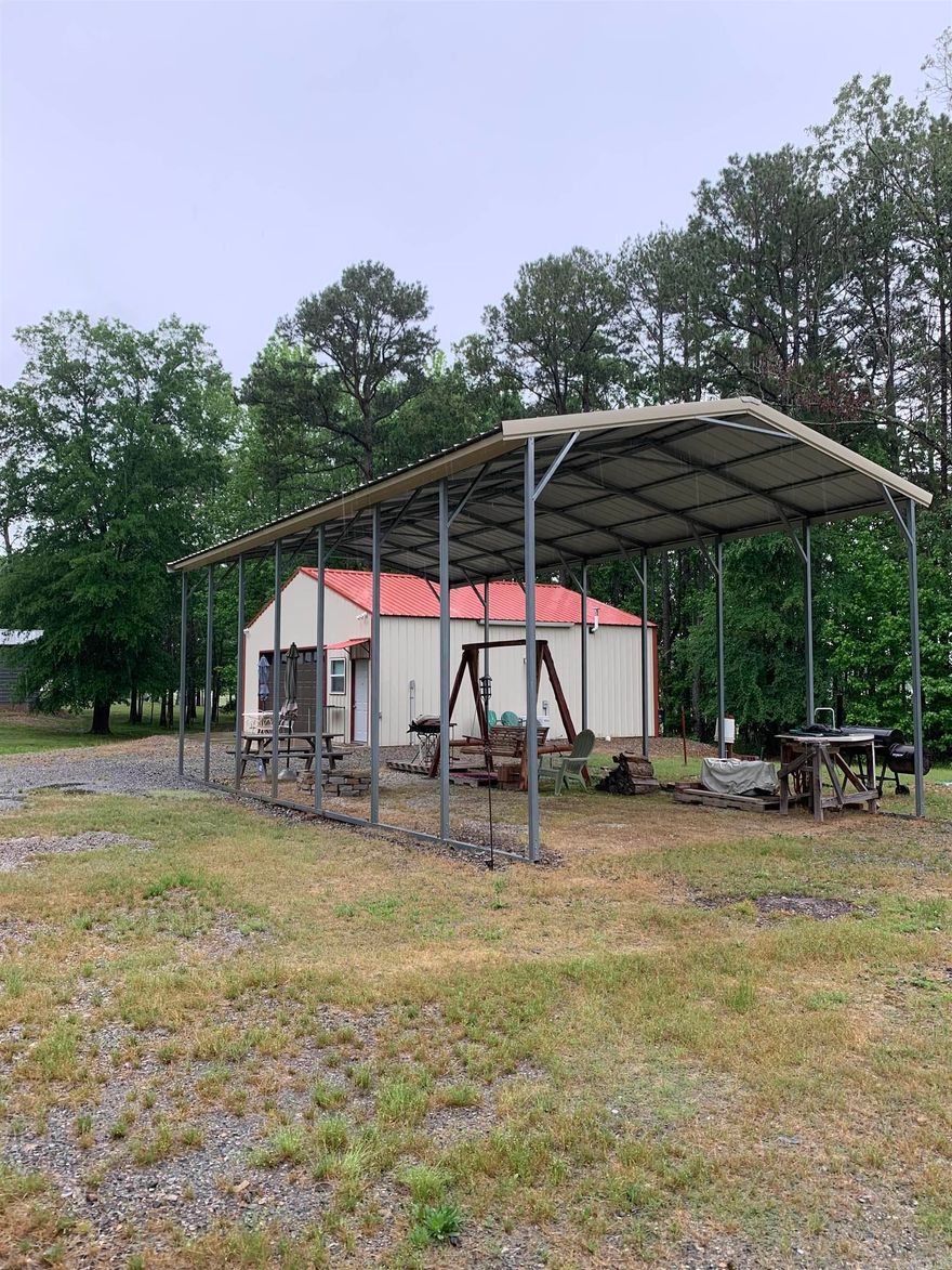Garage apartment with full bath.  Three RV spots with hook-ups