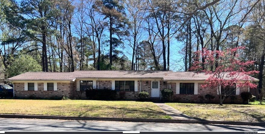 This beautiful and immaculately maintained 3BR, 2 1/2BA home is ready for its new owner!  This jewel has a new roof, new water heater, and stainless-steel appliances.  The kitchen opens to a living area with a wood-burning fireplace which allows for visiting with family and guest while preparing meals, a separate dining room, as well as a 2nd living space.  Step outside to a fully fenced backyard with a patio perfect for relaxing or cooking out, and a 16X16 building with electricity - ideal for an office, hobby space, or workshop, plus a convenient lean-to for lawn equipment.  A 2-car garage with a large storage area adds even more to this property's factuality.  This home offers both style and peace of mind!