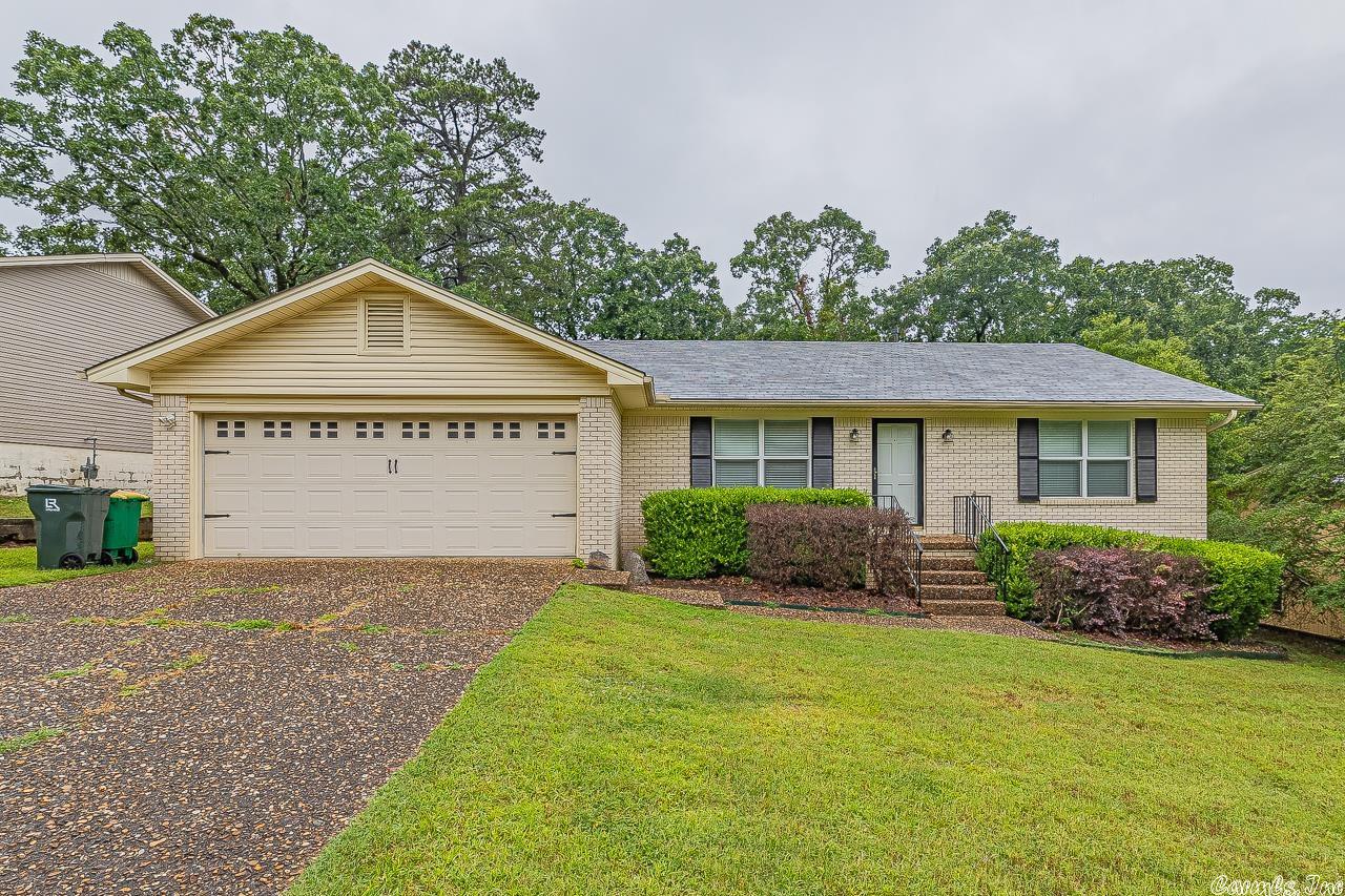Beautiful 3 bd, 2 ba home in Don Roberts school zone of Pleasant Forrest. Enter at the large living area that leads to your gorgeous open kitchen which highlights the breakfast bar. There is a spacious dining area and hearth room with the floor to ceiling brick fireplace .Updates include stainless steel appliances, luxury vinyl floor planks . Step outside to enjoy your large immaculate deck , overlooking fully fenced yard, This is a must see .