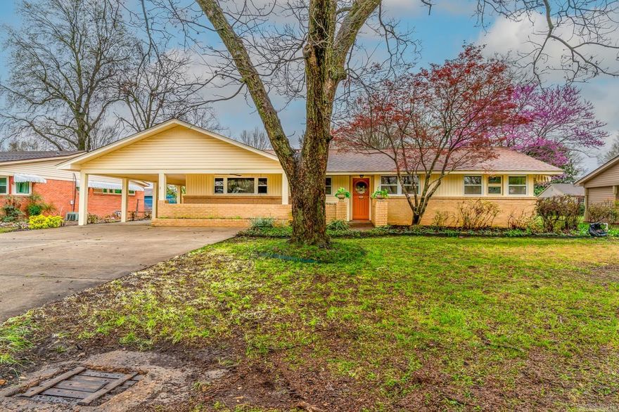 Welcome to Market 311 Davis St. of the RL Davis Sub in Trumann AR within the Trumann School District. A meticulously maintained Midcentury Ranchette wrapped in brick & vinyl, topped w/ architectural shingles, accented w/ stained glass windows, gorgeous landscaping & shade trees, and a large front porch w/ swing. The interior holds 2,393 sf of well laid out living space over a split floor plan that contains an eat-in galley style kitchen, cozy den w/ gas fireplace & built-ins, large living room open to the sunroom which features a gorgeous chandelier, stained glass, marble flagstones, and soothing waterfall & pond views.  The Master wing contains a bedroom w/ generous closet and updated bathroom and the spare wing features 3 bedrooms, full bath, and laundry room w/ built-in cabinets. The exterior holds storage rooms and an outbuilding.  Recent updates to the property include: roof, HVAC, water heater, fresh paint throughout, refinished pond, and more.  You'll love the stained glass imported from England throughout and the midcentury touches.  Conveniently located near favorite local amenities and just a short drive to Jonesboro & Memphis.  Call today to make this house your home.