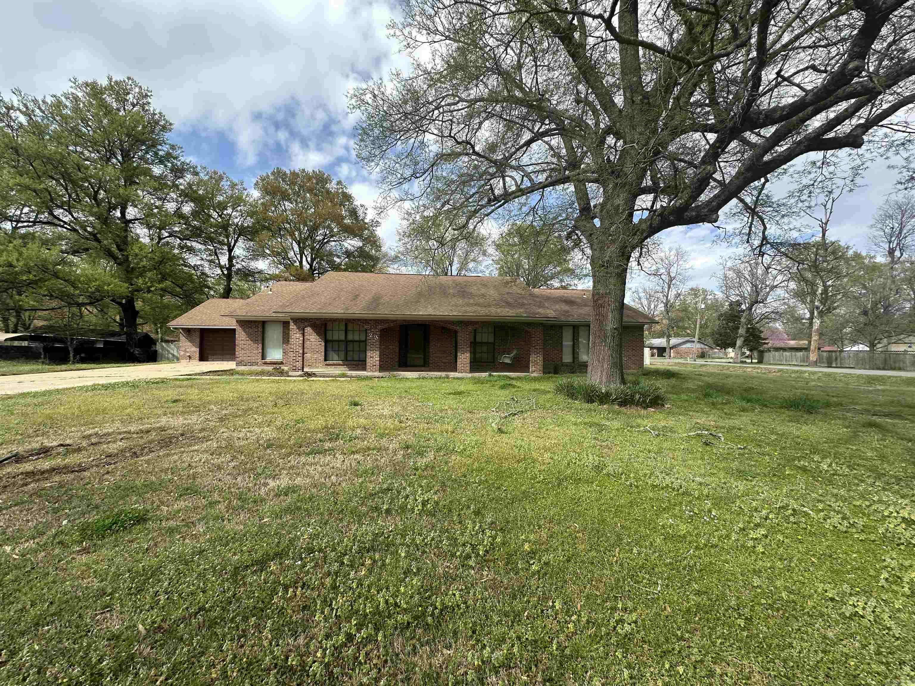 23 Shannon Drive, McGehee, AR This well-kept 3-bedroom, 2-bath home offers plenty of space inside and out! Features include: *. Brand new AV Unit ⢠Large living room and den with wood ceilings and walls ⢠Cozy gas fireplace ⢠Separate dining room plus an eat-in kitchen ⢠Large laundry room ⢠Double vanity sinks in both bathrooms ⢠Spacious master bedroom with two walk-in closets ⢠Spacious screened-in porch overlooking a privacy-fenced backyard ⢠Double garage and large storage building ⢠New septic lines installed ⢠Roof is approximately 7 years old *. Never Flooded Sitting on a large corner lot (150x173) with 2,368 sq ft of heated space, this home has been well cared for and is move-in ready!