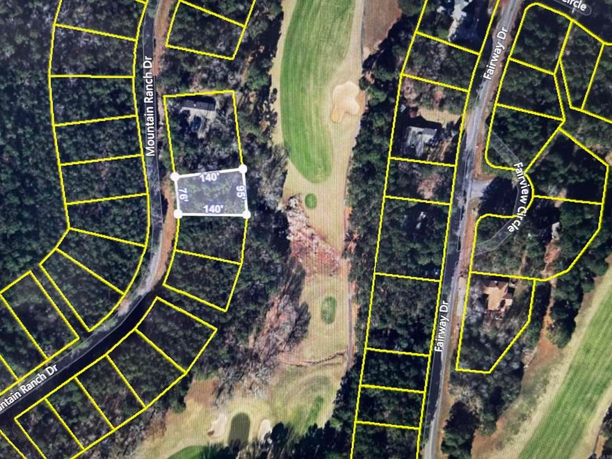 Come build your dream home today on the golf course frontage lot. Enjoy living in Fairfield Bay, where every day feels like a vacation! Nestled amidst the picturesque landscapes of the Mountain Ranch Golf Course, this area offers you the perfect blend of relaxation & adventure. With this prime location, you can indulge in your passion for golf anytime you desire. Tee off during the day & as the sun sets, bask in the breathtaking views of the shimmering lake nearby. This is the epitome of tranquil living at its finest. But that's not all! Fairfield Bay boasts a plethora of amenities to enrich your life. Within minutes of your new abode, you'll find a full-service marina, beckoning you to embark on aquatic adventures whenever the mood strikes. Dive into the refreshing waters of one of the three swimming pools, or challenge your friends to a game of tennis or pickleball. Feel the thrill of exploration as you traverse the hiking & biking trails, or opt for a leisurely round of miniature golf or disc golf. With over 80 miles of UTV trails at your disposal, the possibilities for outdoor recreation are endless. Buyer to pay all closing costs and title insurance.