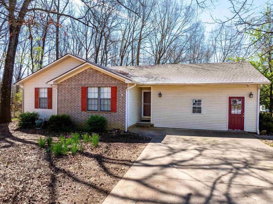 Welcome to this 3BR/2BA home near Batesville, Arkansas, located on a quiet dead-end road just 10 minutes from White River Medical Center, downtown, and shopping. This property offers privacy, low traffic, and a peaceful setting with the convenience of town nearby. Features include a large fenced backyard perfect for pets and kids, plus a two-sided wrap-around deck with access from both the living room and primary suite, creating great indoor-outdoor living. Inside, enjoy a spacious living area with vaulted ceilings, natural light, and a gas fireplace. The kitchen offers a large island, stainless appliances, gas cooktop with griddle, and pantry. The primary suite features deck access, private bath, and large closet, with two additional bedrooms and a full bath down the hall. A bonus flex space (converted garage) serves as a game room, office, or laundry area. Additional highlights: Roof approx. 4 years old Updated bath cabinets/fixtures (2025) Fiber internet available Entergy electric, Summit gas, Batesville water Gas water heater