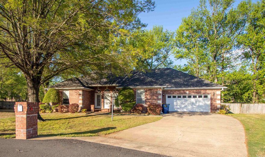 Welcome to your dream home! This charming four-bedroom, two-bath residence boasts a split floor plan, providing both privacy and functionality for family living. As you step inside, you'll notice the elegant hardwood floors that lead you through the formal dining area, perfect for entertaining guests or enjoying family meals. The all-brick exterior not only enhances the home's durability but also adds a classic touch to its curb appeal. Step outside to discover a large deck that overlooks the spacious backyard, adorned with mature trees that offer shade and a serene atmosphere. Nestled in a quiet cul-de-sac within a well-established neighborhood, this home provides a peaceful retreat while still being conveniently close to schools, shopping, and offering easy access to the interstate. Don’t miss the opportunity to make this delightful property your own!