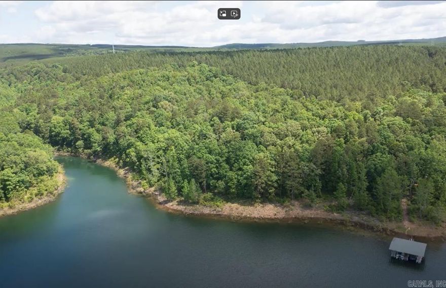 Over 10 Acres of Lakefront Privacy sandwiched between 1363 feet of Whiteline on Greers Ferry Lake to the West/South and 100's of acres of Timber Land to the North/East. It already has a drive and electricity to the property. No covenants/restrictions and no Red Zone. The shoreline is zoned for a boat dock on the Greers Ferry COE Map. More photos coming soon!