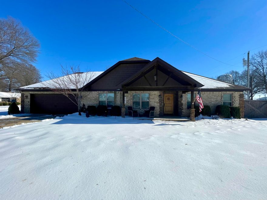 Fall in love with this 3 bedroom, 2 bath, all brick home in a desirable location in Trumann, Arkansas. Easy access to interstate I-555, 15 minutes from Jonesboro and 45 minutes to Memphis. Home sits on a large corner lot with a privacy fenced backyard, front porch, and a large back patio. Our favorite things about this home are the extra large living room, the spacious primary bedroom, the pantry, and the deep linen closets in both bathrooms. There is no carpet throughout and a large sunroom with access to the back yard. Some extras include a security system and a Rethink storm shelter in the garage floor for peace of mind. Call your favorite REALTOR® and come see it for yourself!