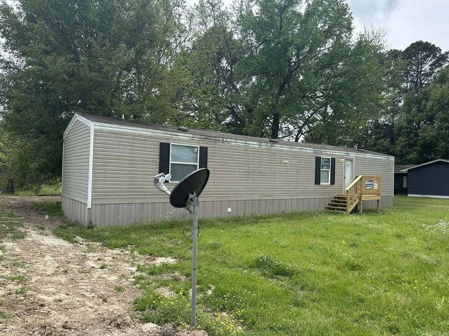 Remodeled 2018 2 bedroom, 2 bath manufactured home. This home offers new carpet, paint, and appliances on an acre. You are just 7 minutes away from Bald Knob, AR!