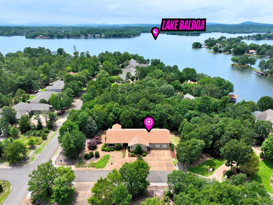 COMMON TO LAKE BALBOA! WALK RIGHT DOWN TO THE LAKE AND FISH! New roof 2018, new hot water heaters 2021, and new HVAC and geothermal unit 2022 are just a few of the MANY updates!  SELLER PAID $2000 BUY-IN FEE & SELLER PAID 1 YEAR HOME WARRANTY WITH REASONABLE OFFER!! Spanning over 6000 sqft, this beautifully updated custom home offers 5 spacious bedrooms, 3 baths, 2 roomy living areas, a hot tub room, office, and MUCH MORE all on the main-level! Downstairs you will find the versatile over 2600 sqft finished basement with a full bathroom and an open-living concept ready to home your home theater, gym, special hobby interests or more! With just a few updates, this area could also make for the perfect mother-in-love quarters or rental area! The outdoor space boasts a deck for relaxing or entertaining, a 6-hole putting green, and a low-maintenance yard. The over-sized 3-car garage has the added convenience of being long enough to fit most bass boats! You will never run out of space in this home! Agents, see remarks.
