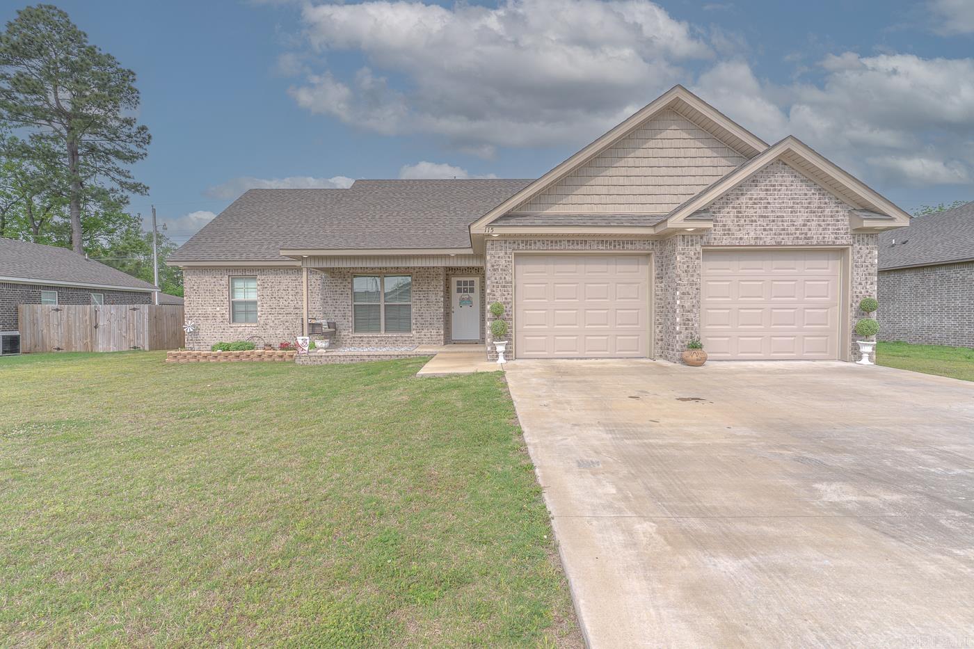Welcome to 115 Pecan St in Lake City! Built in 2022, this all-brick home offers 4 spacious bedrooms, 2 full baths, and a large open floor plan with a split-bedroom layout. The kitchen and living areas flow seamlessly, featuring a gas fireplace, lots of storage, and modern finishes throughout. The primary suite includes a tub and shower combo, along with a generous walk-in closet. Additional highlights include an attached two-car garage, architectural shingle roof, and a fully fenced backyardāperfect for outdoor enjoyment. Located just minutes from Riverside Schools, right off Hwy 18, and only 15 minutes from Jonesboro. Qualifies for USDA Rural Development financing. This one checks all the boxesāschedule your showing today!