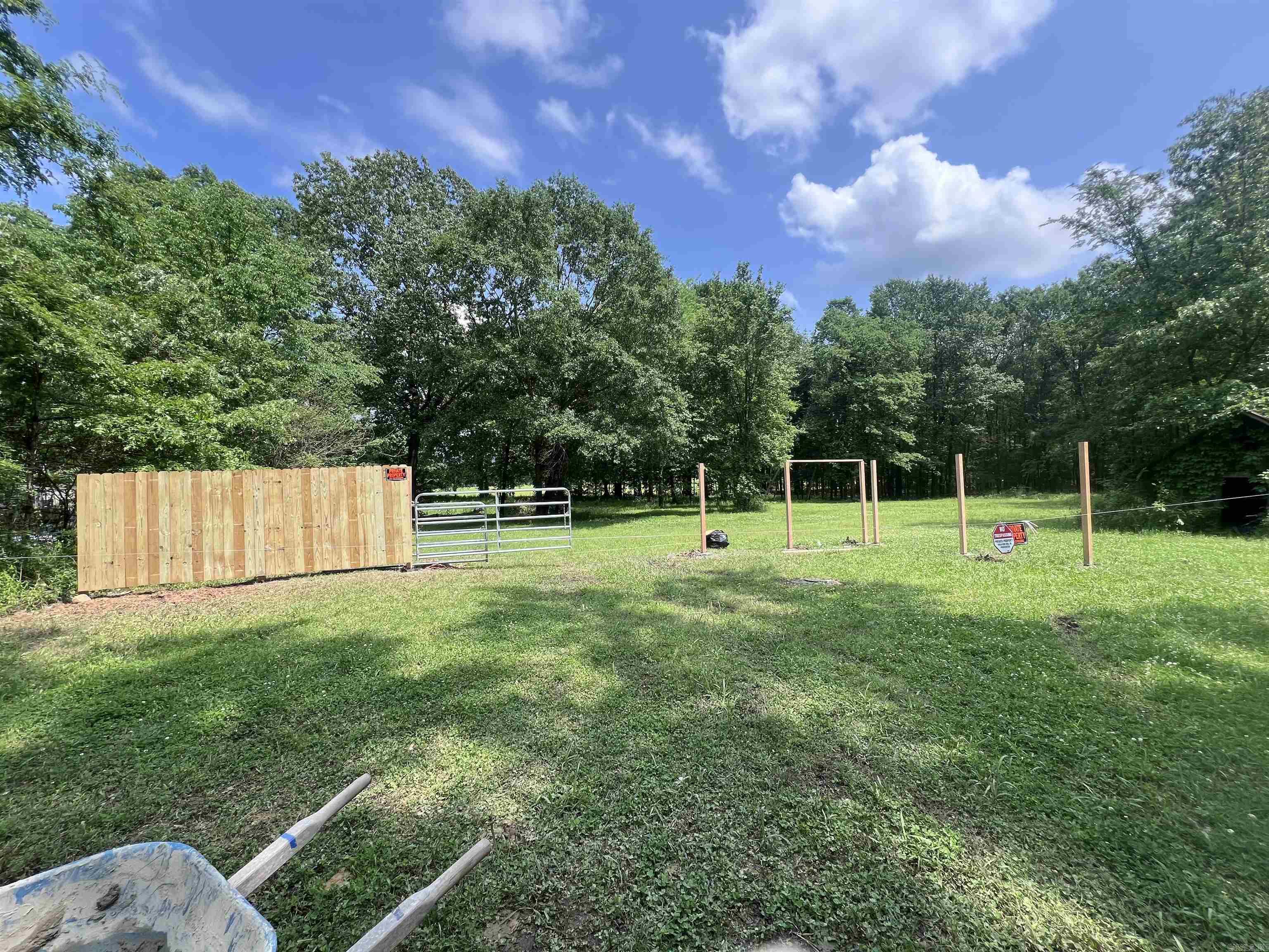 Nice lot that is partially fenced and has gate entry. Property being sold as is. No sign on property. Agents see remarks
