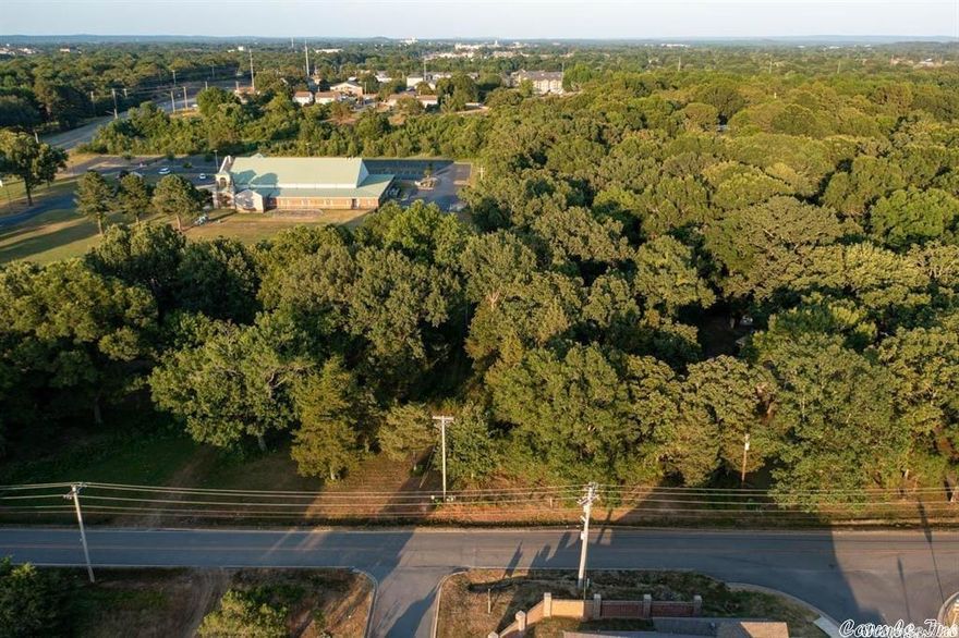 LOCATION-LOCATION- LOCATION!!! 1.4 acre lot that can possibly be subdivided into 5 lots with city approval. The land is located right off of Dave Ward Drive and backs up to the University Church of Christ. Great development opportunity!!!