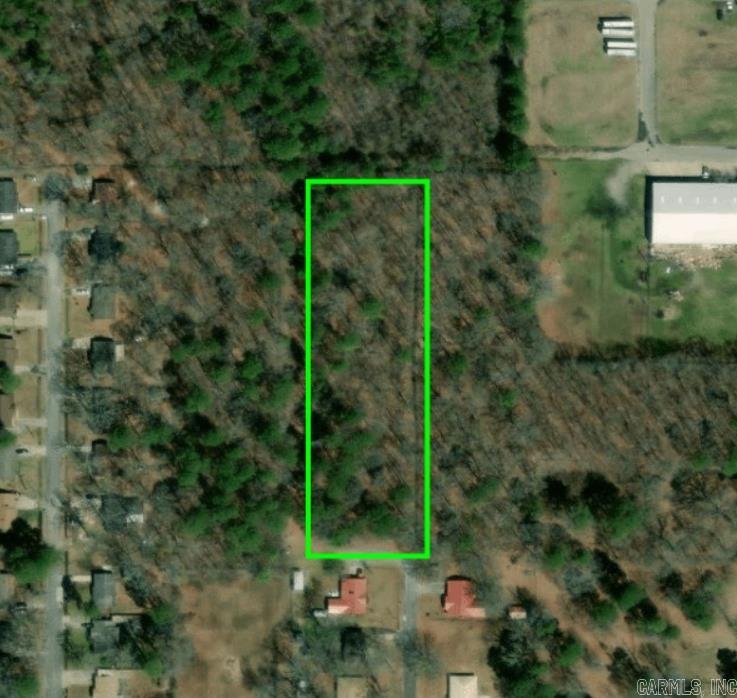 Attention builders and investors! This is a rare opportunity to acquire 14 platted lots totaling 4+ wooded acres in an area with strong development potential. Whether you're looking to build a small subdivision, custom homes, or hold as a land investment, this property offers flexible options in a beautiful, natural setting. The land is level to gently rolling with mature trees, offering a great canvas for development. Utilities nearby (buyer to verify). With demand for housing on the rise, this is a prime chance to capitalize on a high-potential piece of land. Don't miss it!